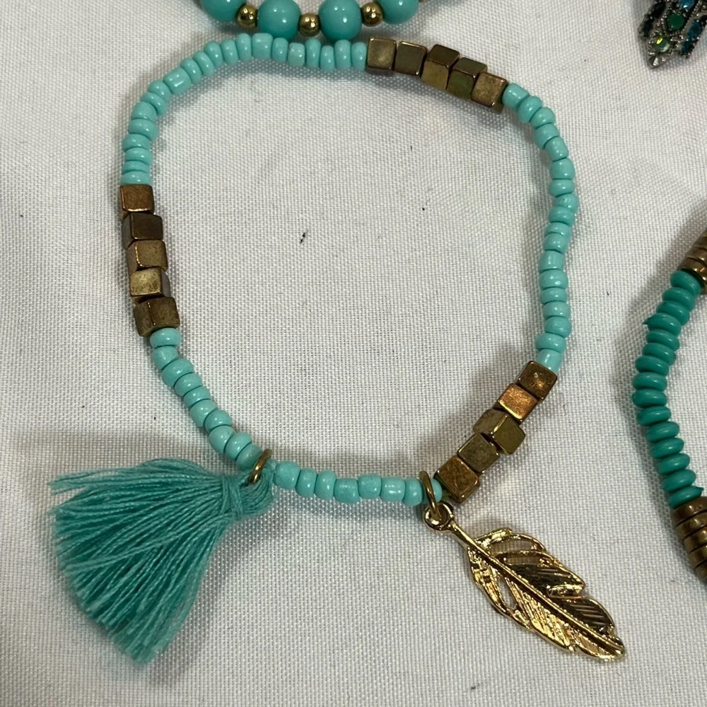 Set of four- turquoise bead bracelets.